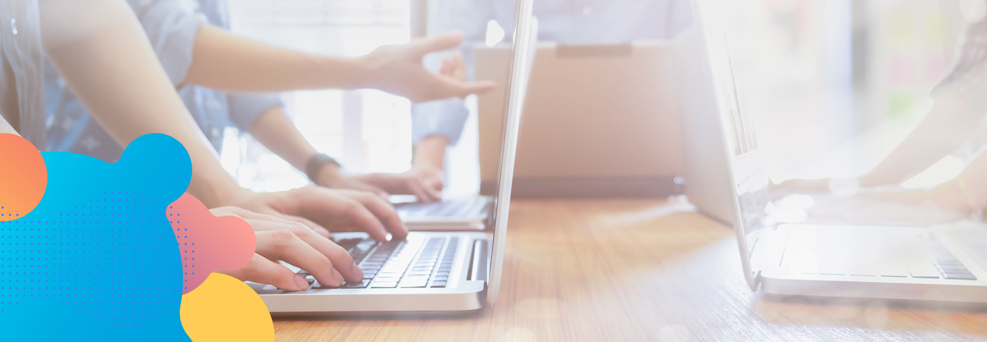 3-ways-for-companies-to-become-more-customer-obsessed-with-tech Displays a team of people working on their laptops without showing their faces
